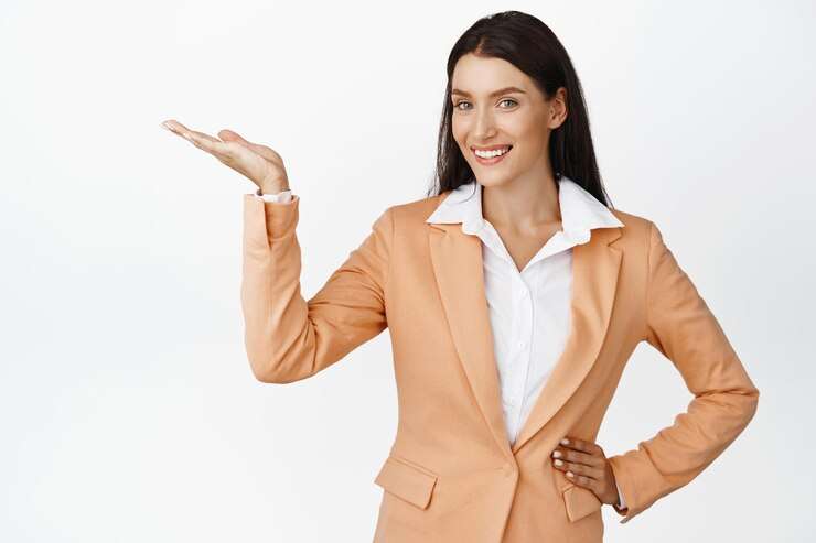 successful-corporate-woman-demonstrating-product-pointing-empty-space-showing-advertisement-smiling-standing-suit-white-background_176420-49127.jpg